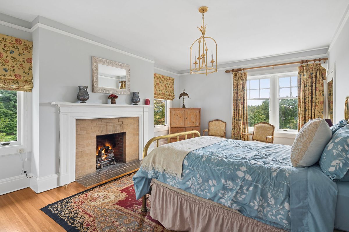 Bedroom with fireplace at 184 Upper Mountain Avenue
