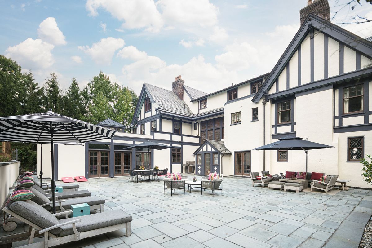 Expansive bluestone patio behind the house at 184 Upper Mountain Avenue