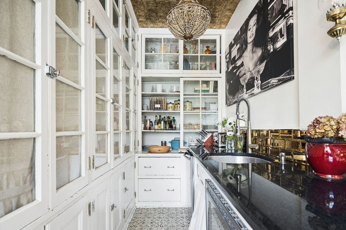 Butler's kitchen with glass front cabinetry at 184 Upper Mountain Avenue
