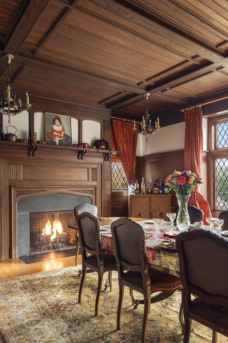 Dining room fireplace beneath the coffered ceiling at 184 Upper Mountain Avenue