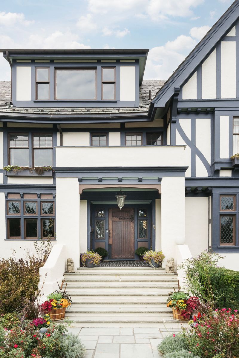 Stone steps rising to the arched front entry of 184 Upper Mountain Avenue