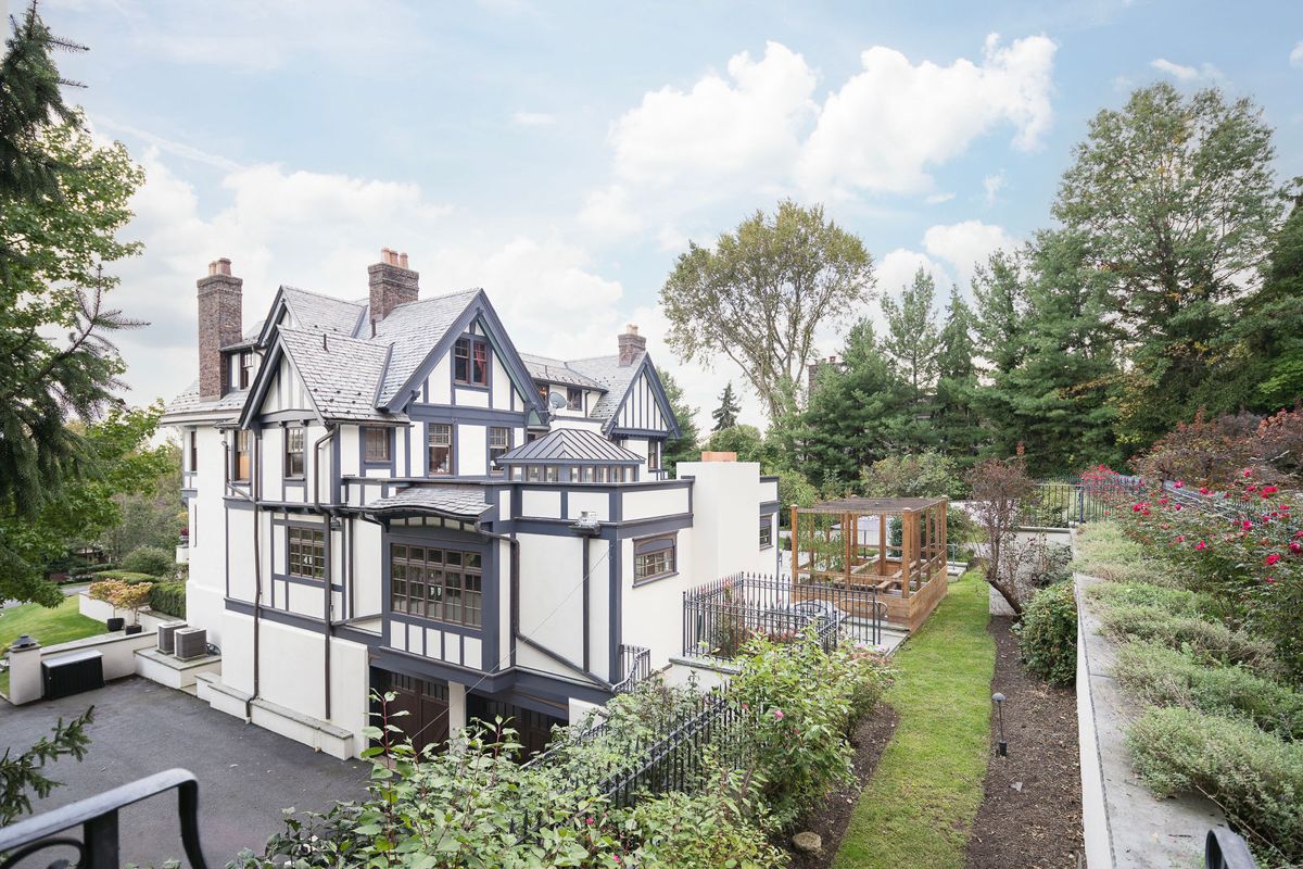 Side garden elevation of 184 Upper Mountain Avenue with planted terraces
