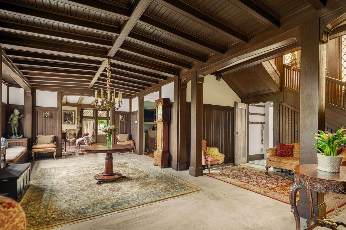 The hall and stair landing beneath a beamed ceiling at 184 Upper Mountain Avenue