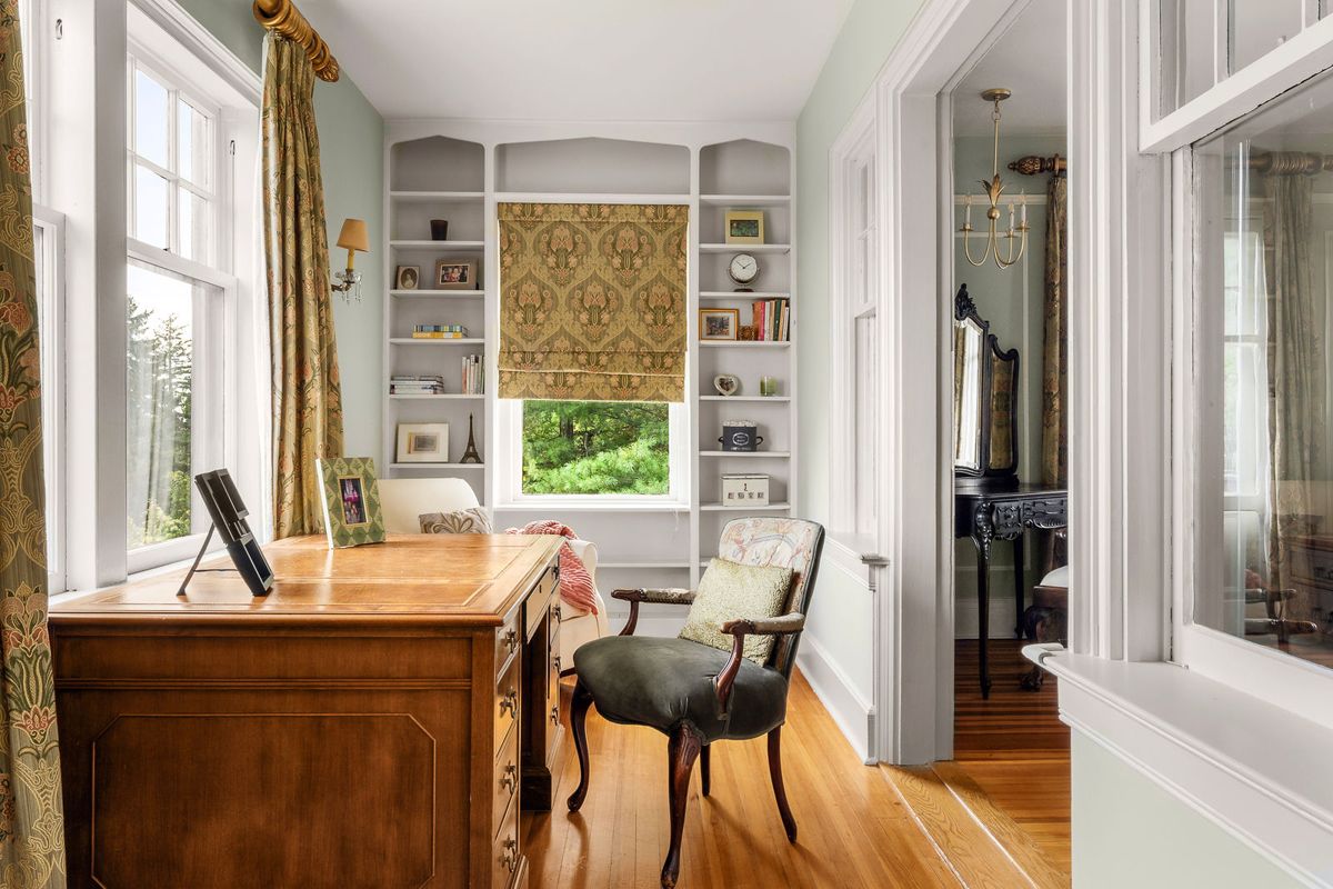 Study with built in bookshelves and garden views at 184 Upper Mountain Avenue