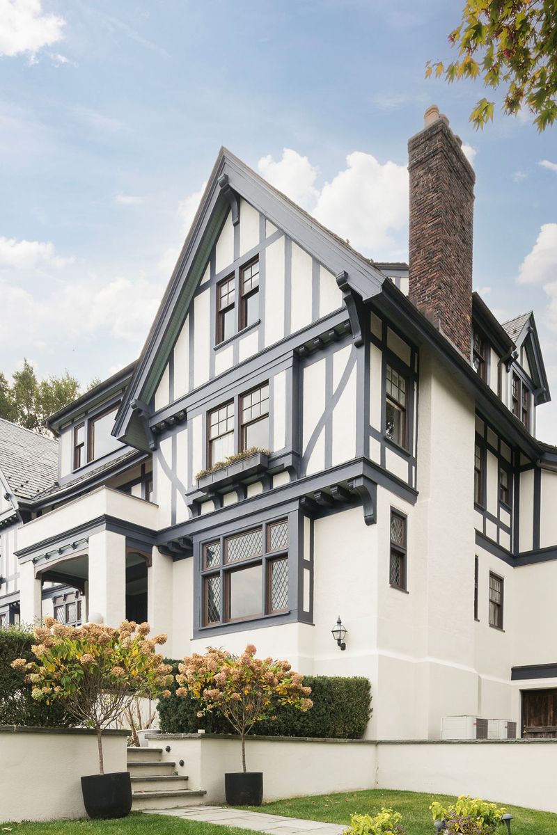 Steep Tudor gables and a brick chimney at 184 Upper Mountain Avenue